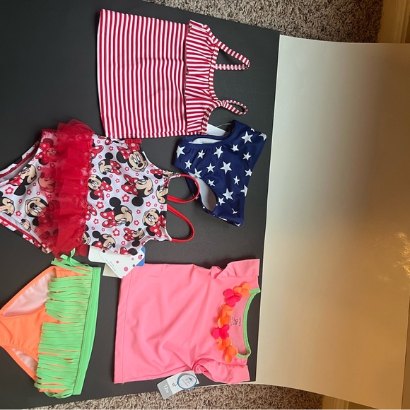New w/Tags 3 swimwear sets. Size 12M. Includes Osh Kosh, Carters and Disney - Picture 2 of 4